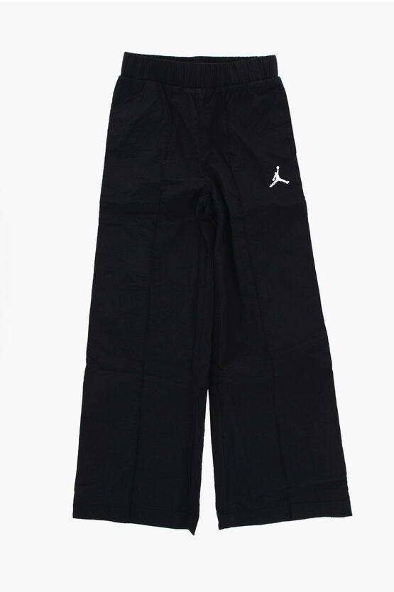 Shop Nike Air Jordan Nylon Pants With Logoed Side Bands