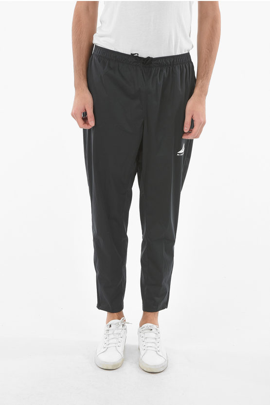 Nike Ankle Zipped Solid Color Joggers In Black