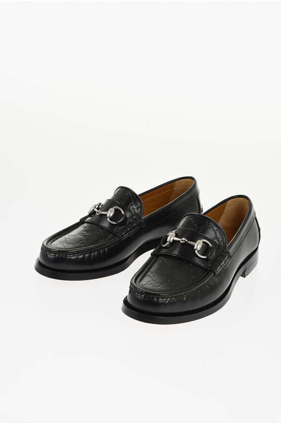Gucci Brushed Leather Loafers With Monogram Embossed Detail In Black