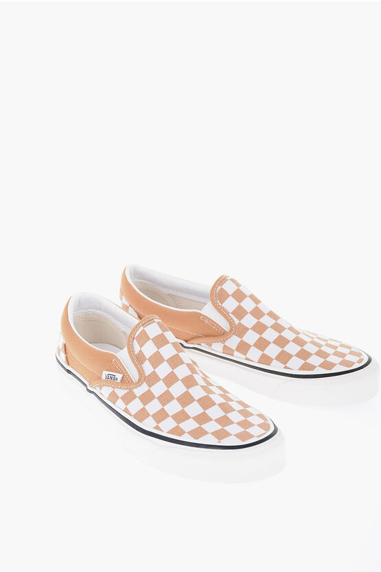 Shop Vans Checkboard Classic Slip On Sneakers
