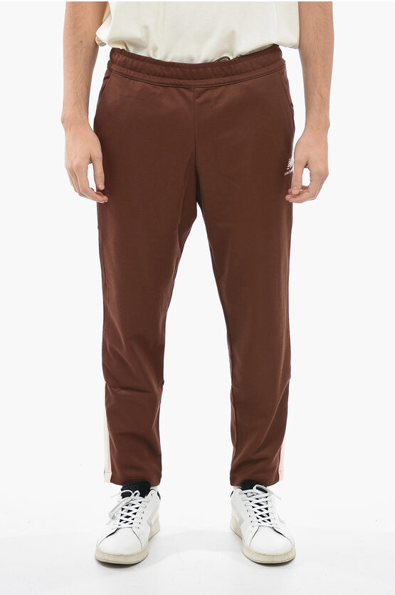New Balance Contrast Side Band Solid Color Joggers In Brown