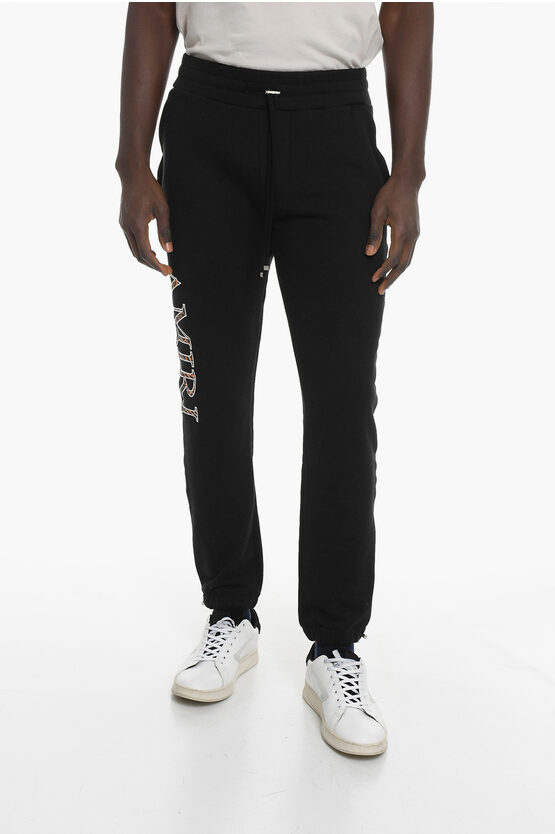 Shop Amiri Cotton Sweatpants With Leopard Logo