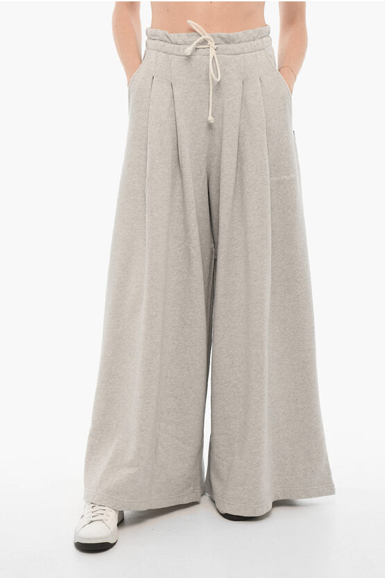 Shop Palm Angels Double-pleat Wide Leg Sweat Pants