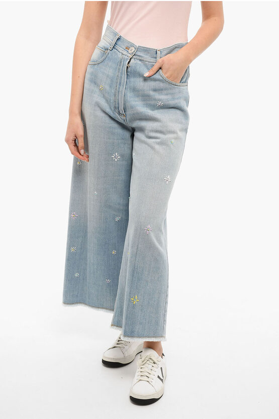 Shop Forte Forte Embroidered Wide Legged Jeans With Raw Cut Bottom