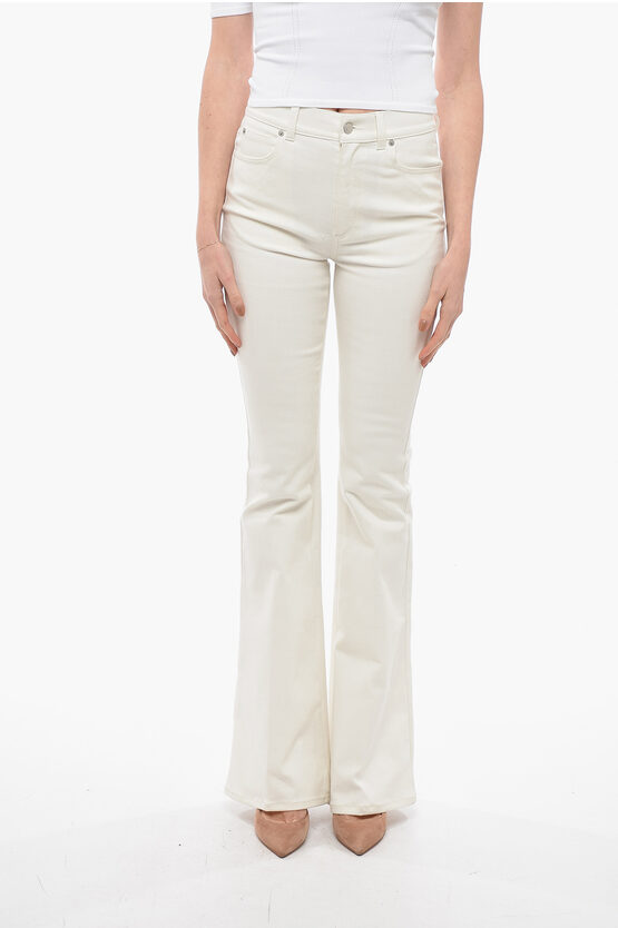 Alexander Mcqueen Flared Denims With Back Logo Patch 28cm In Neutral