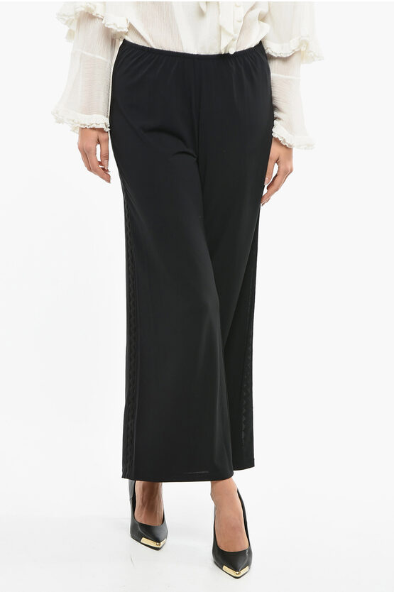Eres Flared Vergine Trousers With Perforated Side Bands In Black