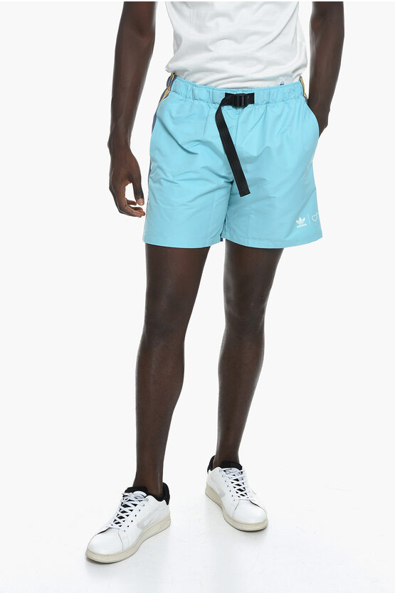 Shop Adidas Originals Human Made Shorts With Contrasting Side Bands And Industrial
