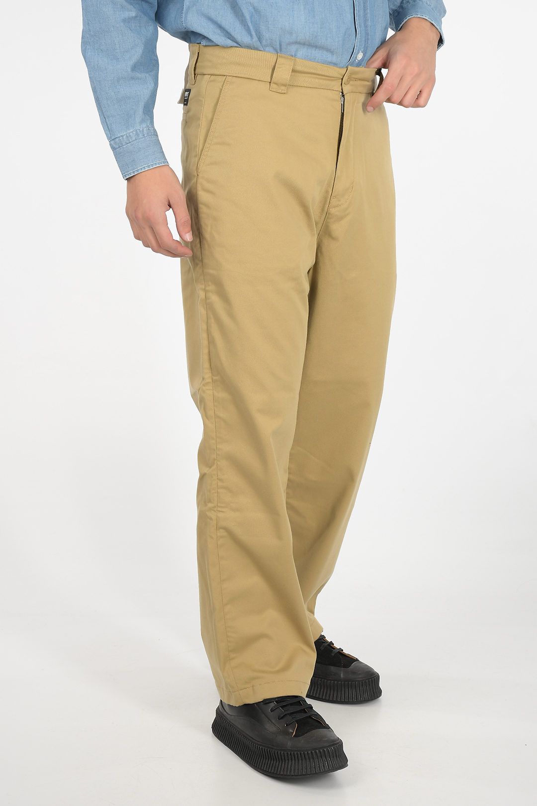 Buy Black Relaxed Fit Stretch Chino Trousers from Next India