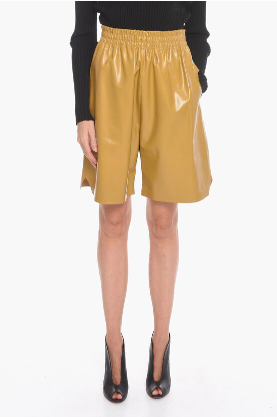 Bottega Veneta Leather Shiny Gaucho Shorts In Yellow