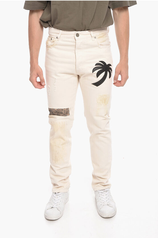 Palm Angels Lived-in Slim Fit Denims With Leather Logo Patch 17cm In White