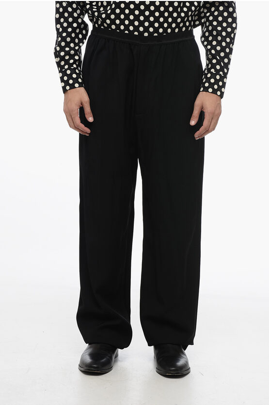 BALENCIAGA LOOSE-FIT PANTS WITH LOGOED WAISTBAND 