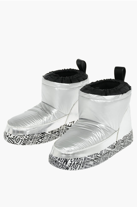 Moschino Love All Over Logo Sole Moonboot Ankle Boots In Metallic