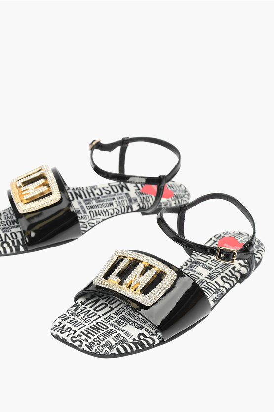 Moschino Love Patent Leather Flat Sandals With Logoed Jewel Detail In Black