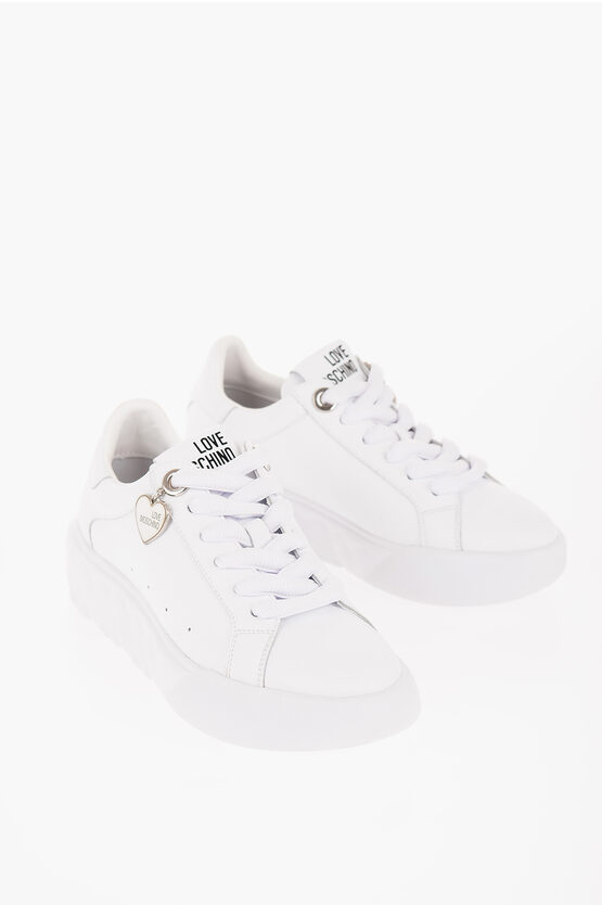 Moschino Love Solid Color Leather Low Top Sneakers With Logoed Charm In White