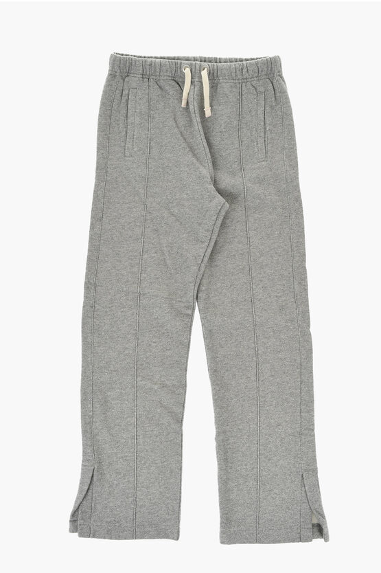PALM ANGELS LUREX SWEATPANTS WITH ANKLE SLIT