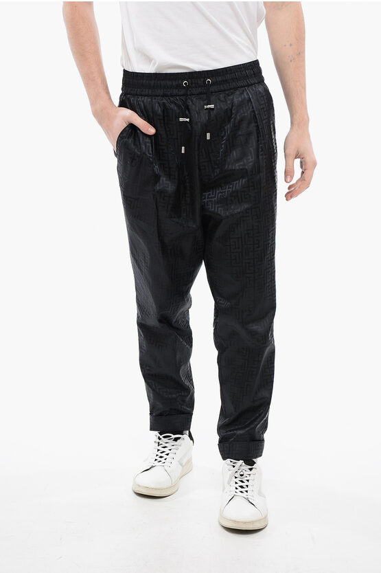 Shop Balmain Monogram Nylon Sweatpants With Flush Pockets
