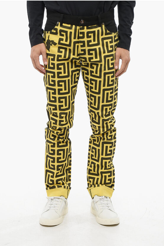 Balmain Pokemon Two-tone Jeans With Cuffed Hem And All-over Monogram In Yellow