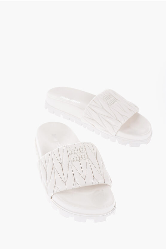 Shop Miu Miu Quilted Leather Slides