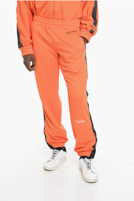 Heron Preston Side Logoed Band Cotton Blend Track Sweatpants In Orange