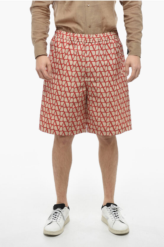 Shop Valentino Silk Shorts With All Over Logoed Pattern