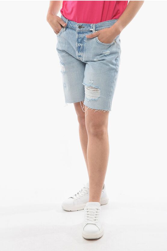 Frame Slouch Fit Denim Distressed Shorts In Blue