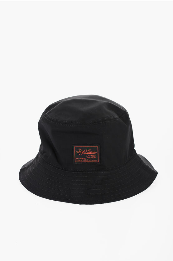 Shop Raf Simons Solid Color Bucket Hat With Logo Patch