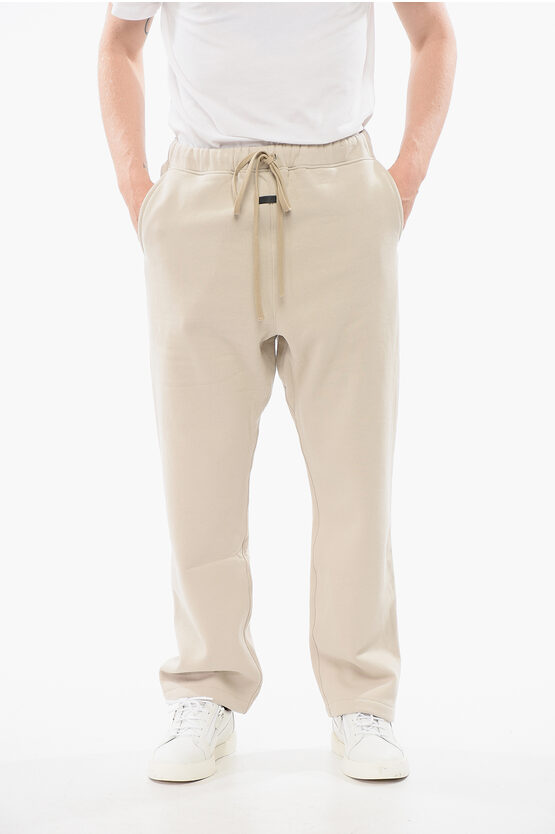 Fear Of God Solid Color Cotton Joggers With Contrasting Logo Patch In Neutral