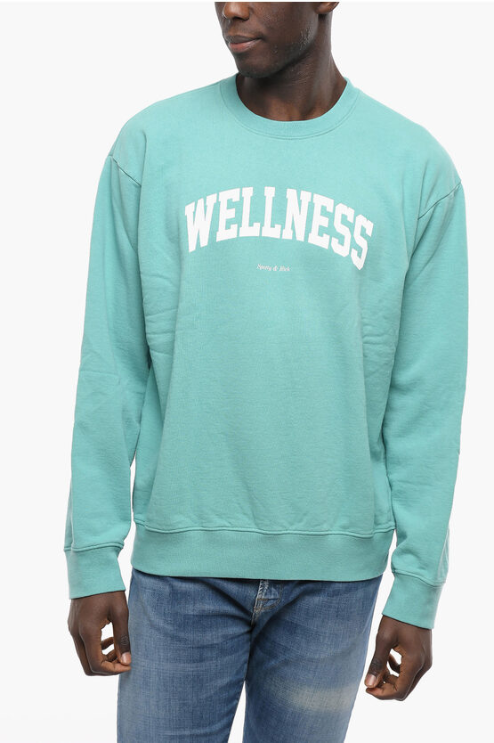 Sporty And Rich Solid Color Crew-neck Sweatshirt With Contrasting Print In Blue