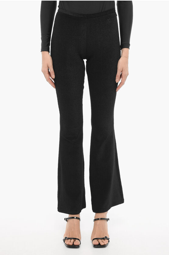 Shop Courrèges Solid Color Flared Pants With Side Zip