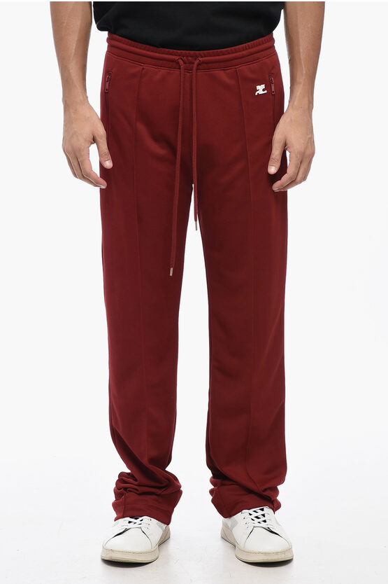 Shop Courrèges Solid Color Joggers With 3 Pockets