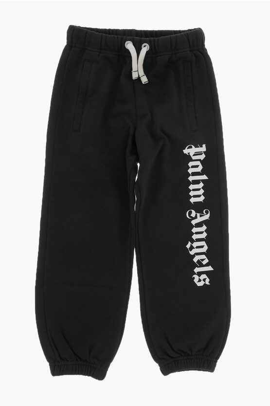 Shop Palm Angels Solid Color Joggers With Contrast Logo