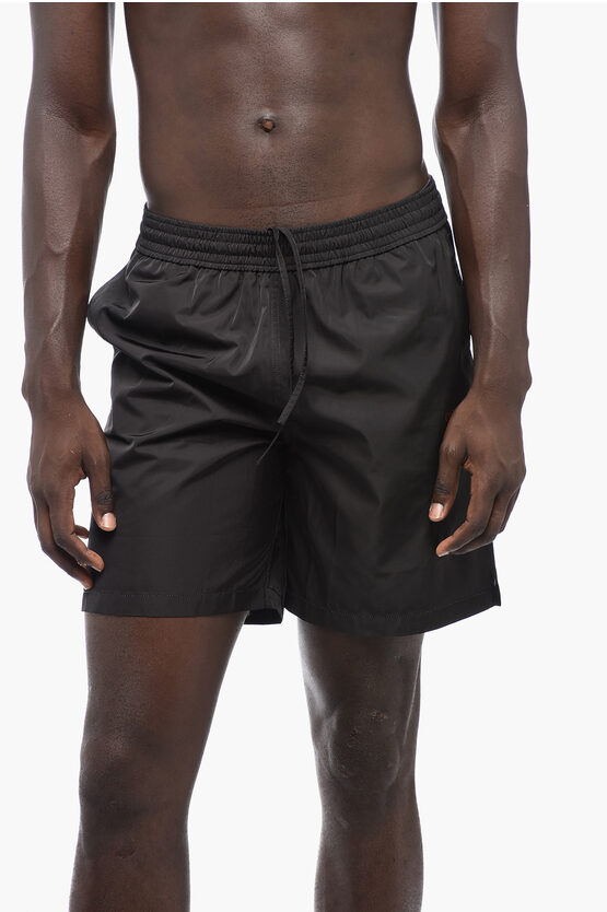 Off-white Solid Color Moon Tab Swim Shorts With Contrasting Print