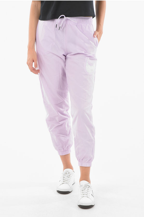 Nike Solid Colour Nylon Loose Fit Joggers In Pink