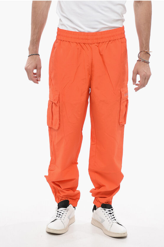 Awake New York Solid Color Nylon Pants In Orange