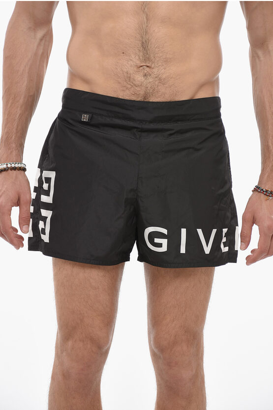 Shop Givenchy Solid Color Swim Shorts With Contrasting Logo