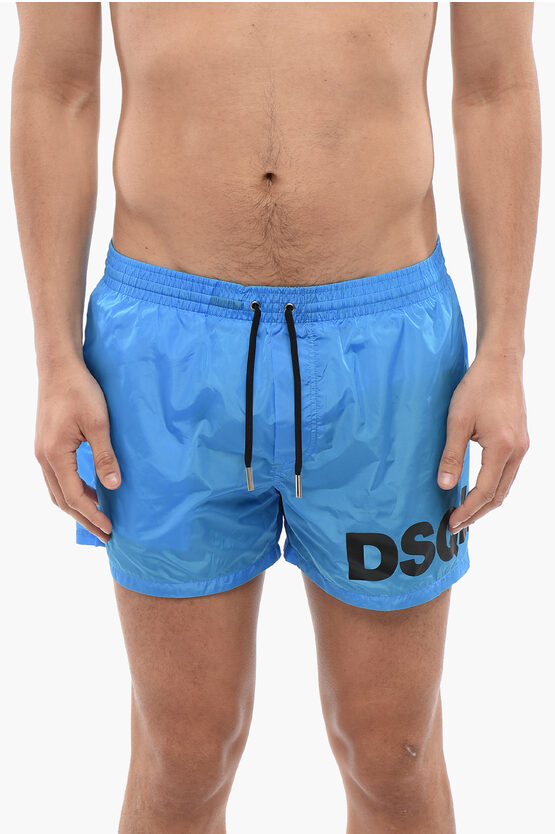 DSQUARED2 SOLID COLOR SWIM SHORTS WITH PRINTED LOGO