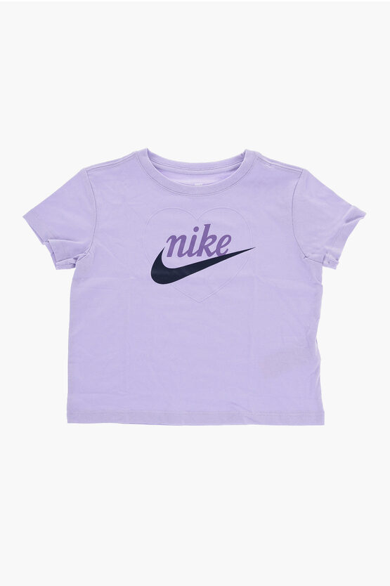 Shop Nike Solid Color T-shirt With Printed Logo