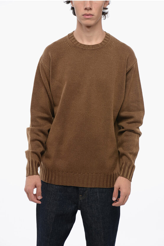 Shop Auralee Solid Color Wool Crew-neck Sweater