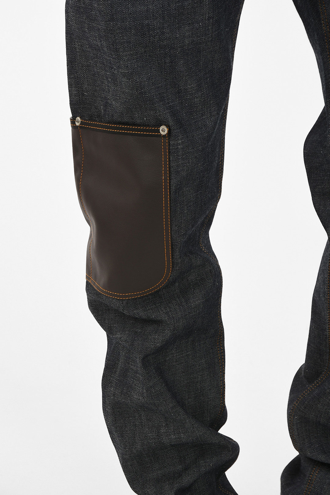 Jeans with leather pocket detail