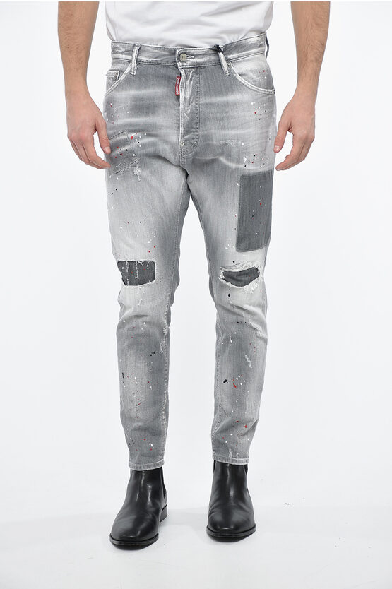 Shop Dsquared2 Surf & Fun Distressed Relax Long Crotch Denims With Paint Sp