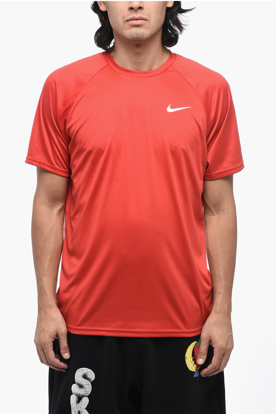 Shop Nike Swim Solid Color Dri-fit T-shirt With Printed Logo