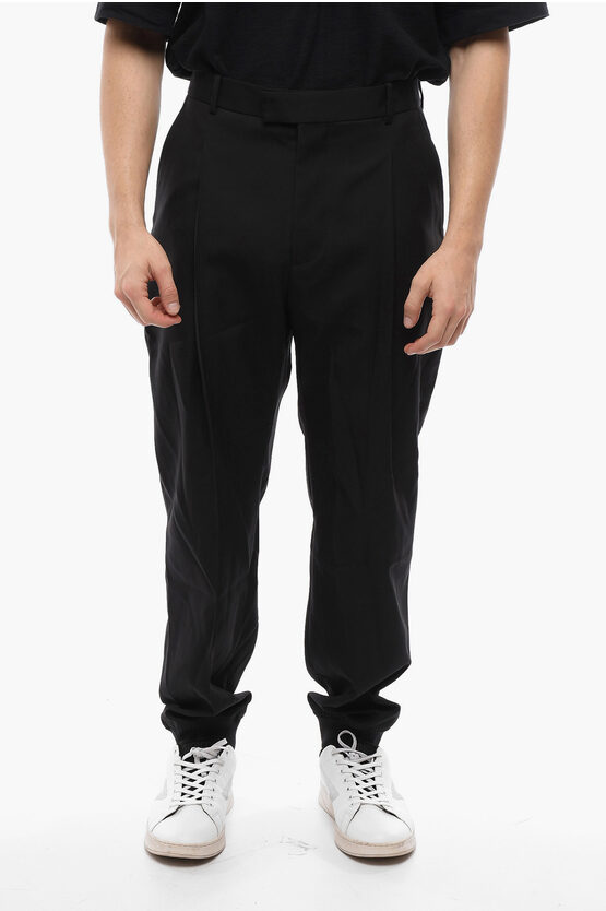 Alexander Mcqueen Tailored Wool Pants With Knitted Cuffs In Black