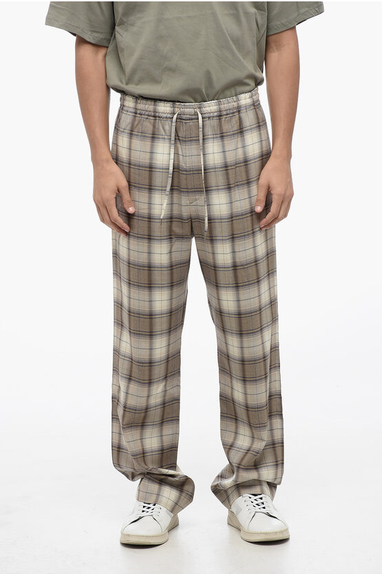 Shop Auralee Tartan Checked Wool Casual Pants