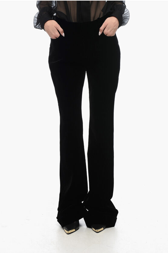 Shop Saint Laurent Velvet Flared Pants