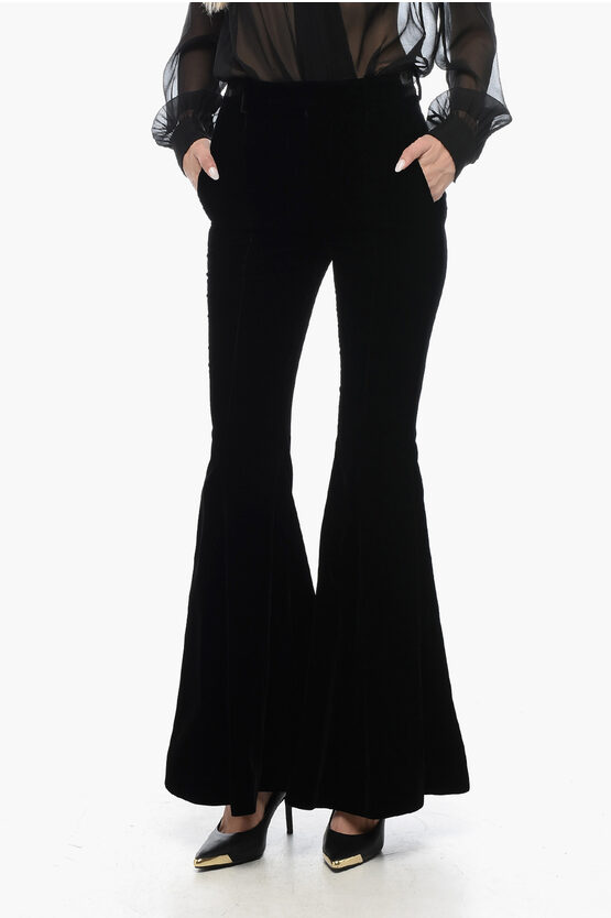 Shop Saint Laurent Velvet Flared Pants