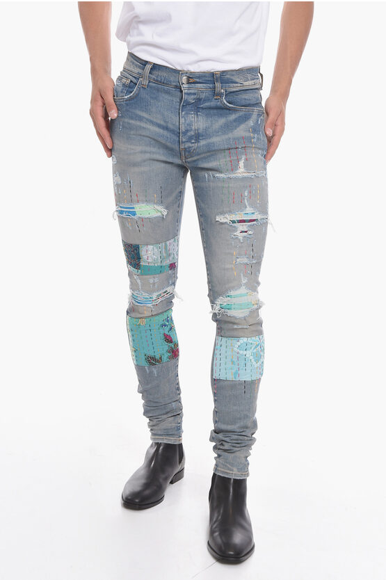 Amiri Vintage-effect Artpatch Skinny Denims With Embroidered Detai In Blue
