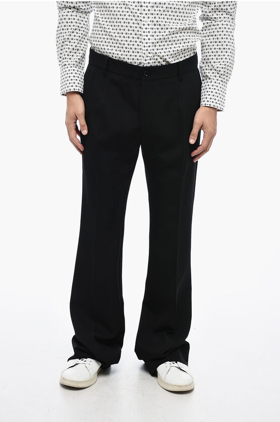 Shop Dolce & Gabbana Virgin Wool Pants With Flared Fit